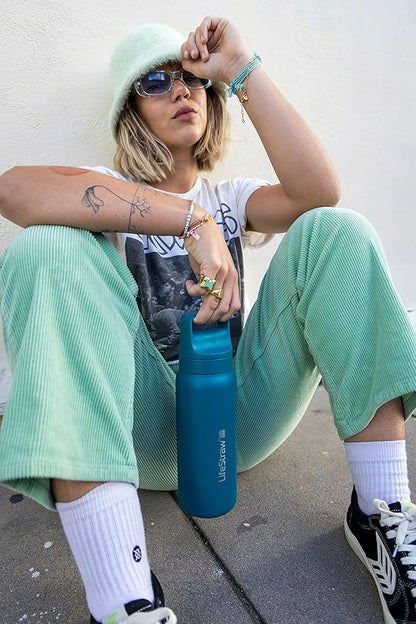 LifeStraw Go Series — Insulated Stainless Steel Water Filter Bottle for Travel and Everyday Use Removes Bacteria, Parasites and Microplastics, Improves Taste, 24oz Laguna Teal
