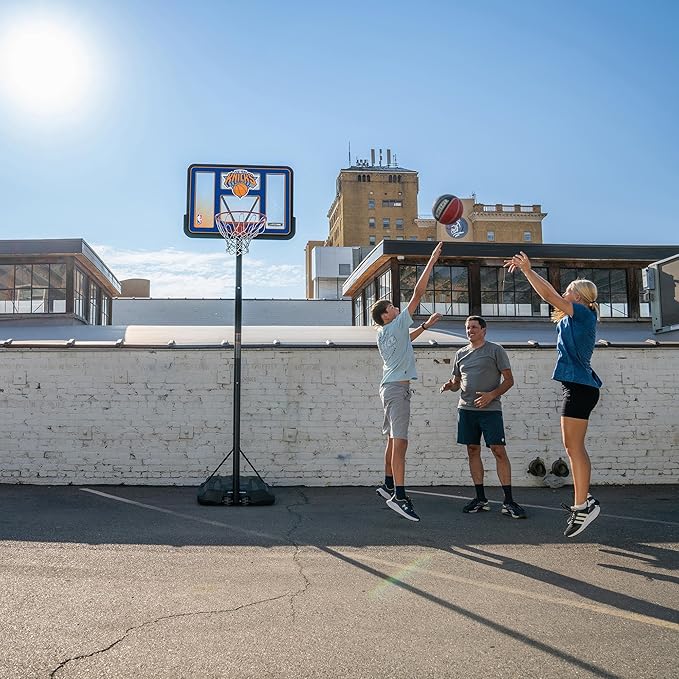 Lifetime NBA New York Knicks Portable Basketball Hoop, Adjustable Height 7.5-10 Ft, 44 Inch Shatterproof Fusion Backboard, Base with Wheels